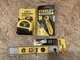 A three piece STANLEY handyman tool set: 16&rsquo; tape, FATMAX knife, magnetic level